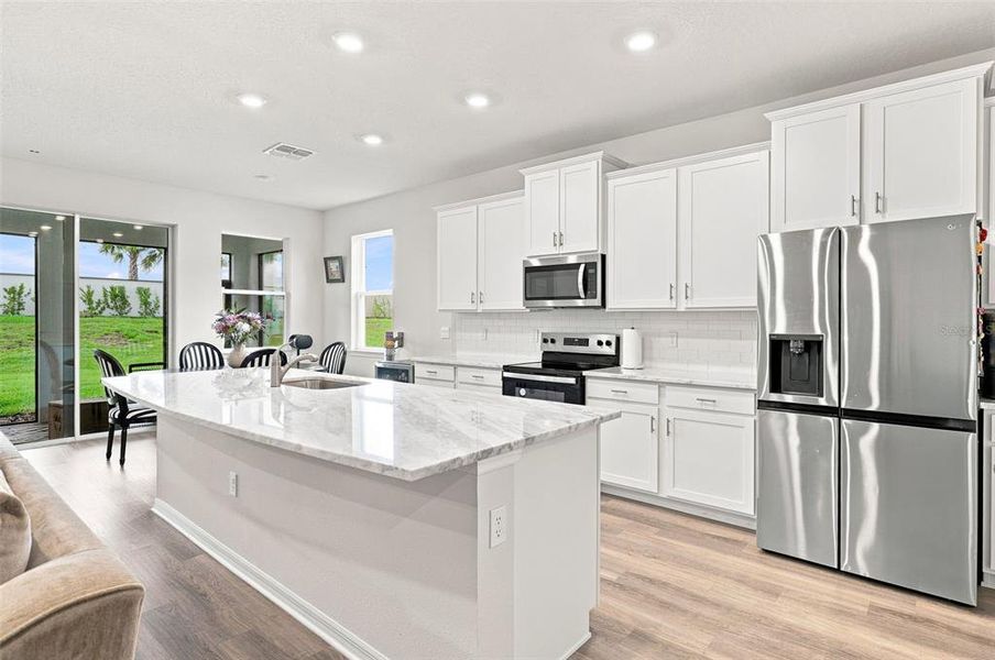 Furnished interior view inside a new home in Star Farms at Lakewood Ranch, Bradenton (Image 7).
