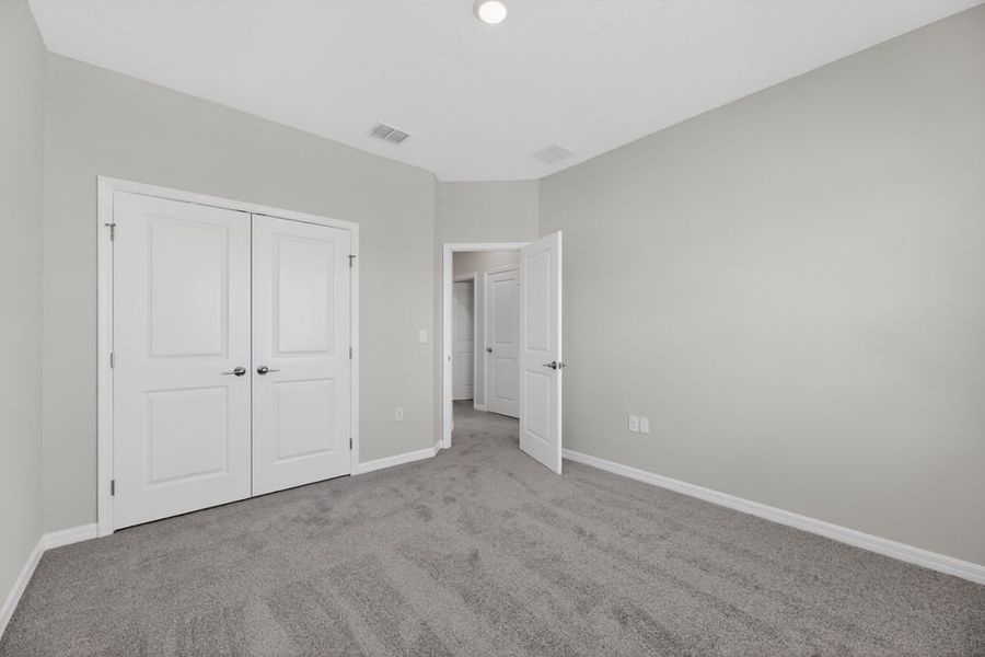 Representative unfurnished interior of a home built from the Bellflower by Taylor Morrison in Cherry Elm at SilverLeaf, St. Augustine (Image 28).
