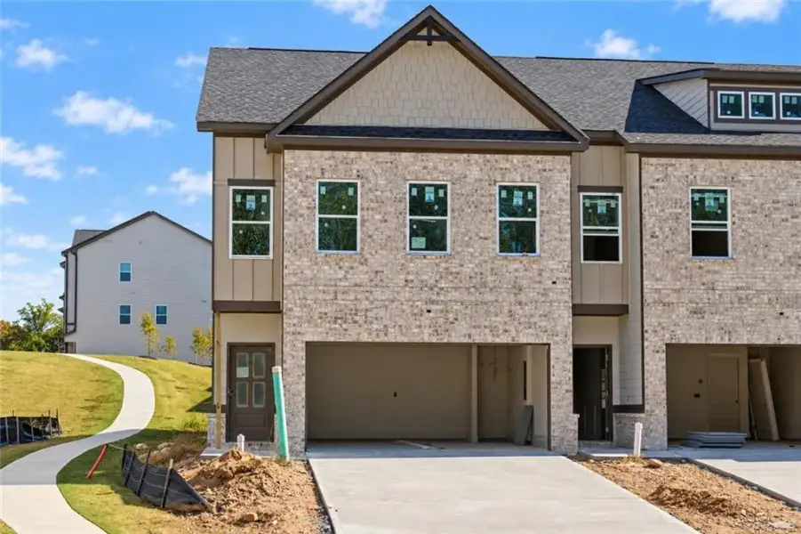 Front exterior of a new home in , Norcross, GA, highlighting curb appeal (Image 2). Front exterior of a new home in , Norcross, GA, highlighting curb appeal (Image 2).