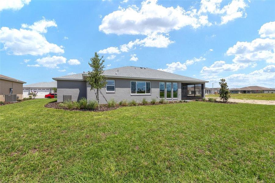 Front exterior of a new home in On Top of the World Communities, Ocala, FL, highlighting curb appeal (Image 16).
