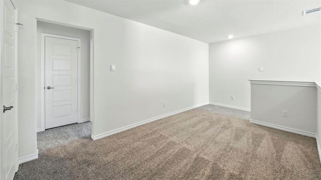 Unfurnished room featuring carpet flooring and recessed lighting
