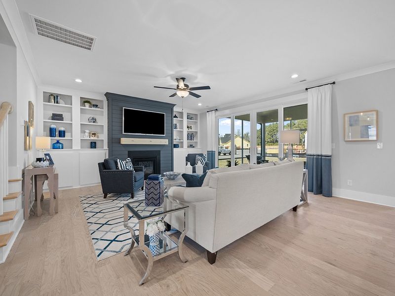 Representative furnished interior of a home built from the The Hampton by RobuckHomes in Windwater, Hampstead (Image 6).