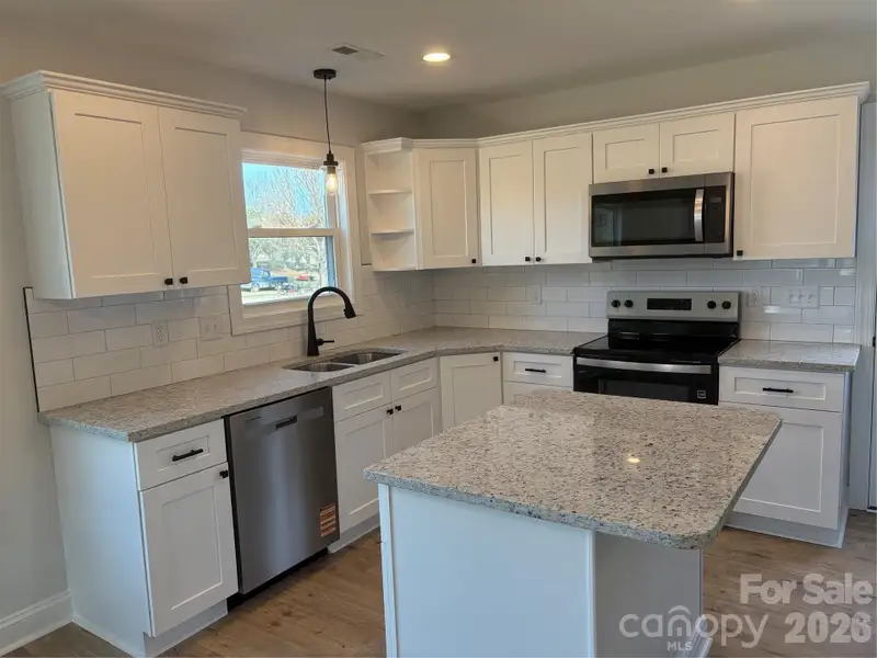 Furnished interior view inside a new home in , Statesville (Image 5).