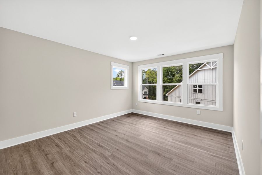 Representative unfurnished interior of a home built from the Weston End Unit by Baker Residential in Parc at Bradley Farm, Apex (Image 26).