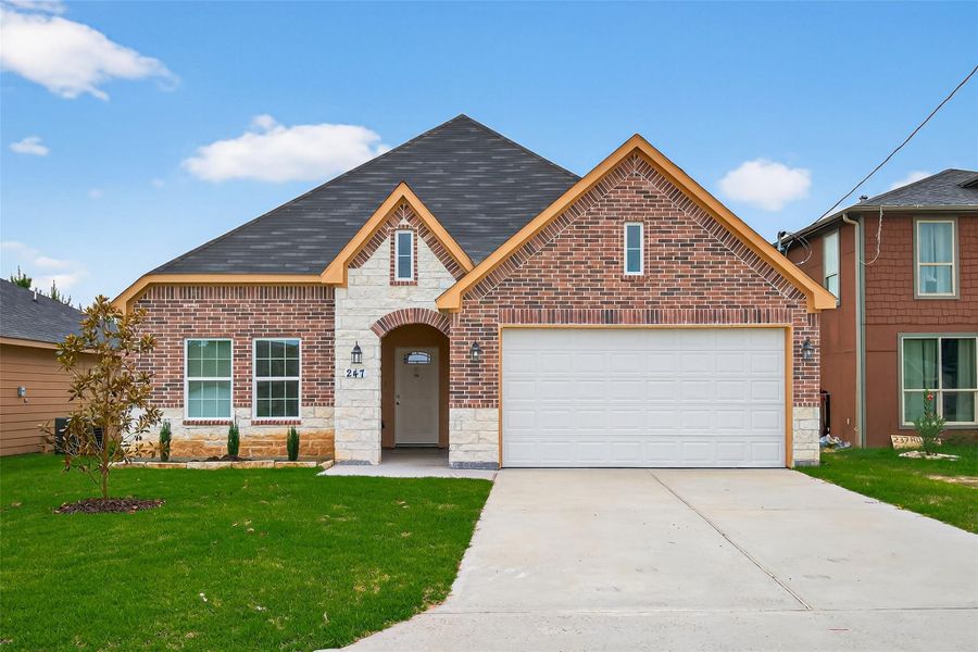 Front exterior of a new home in , Cleveland, TX, highlighting curb appeal (Image 25). Front exterior of a new home in , Cleveland, TX, highlighting curb appeal (Image 25).