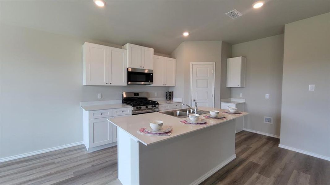 Kitchen - All Home and community information, including pricing, included features, terms, availability and amenities, are subject to change at any time without notice or obligation. All Drawings, pictures, photographs, video, square footages, floor plans, elevations, features, colors and sizes are approximate for illustration purposes only and will vary from the homes as built.