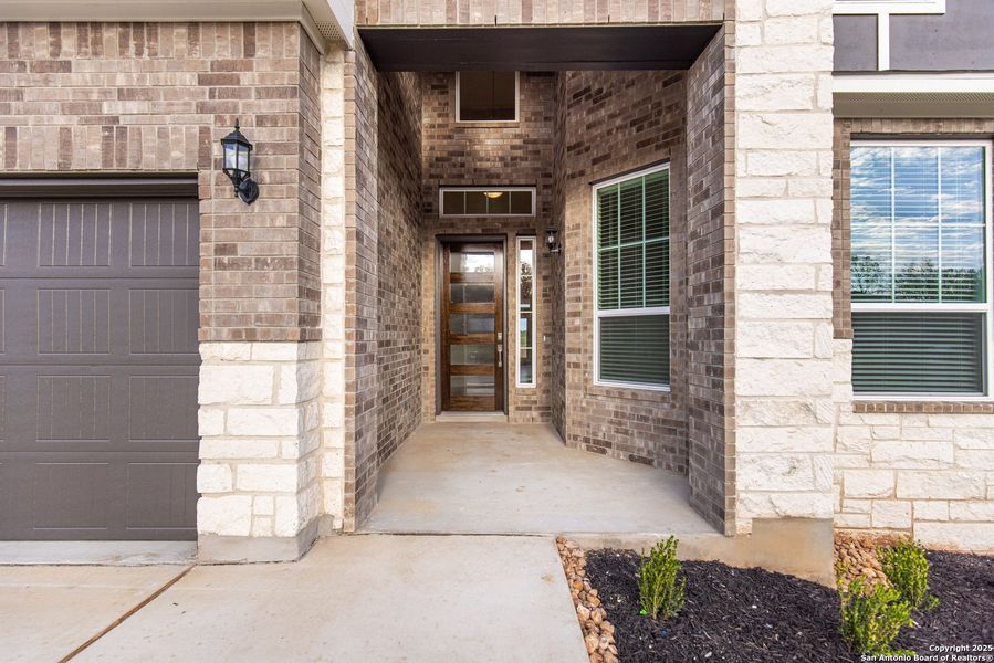 Exterior details and patio area of a home in Buffalo Crossing – New Phase Now Preselling, Cibolo (Image 1). Exterior details and patio area of a home in Buffalo Crossing – New Phase Now Preselling, Cibolo (Image 1).