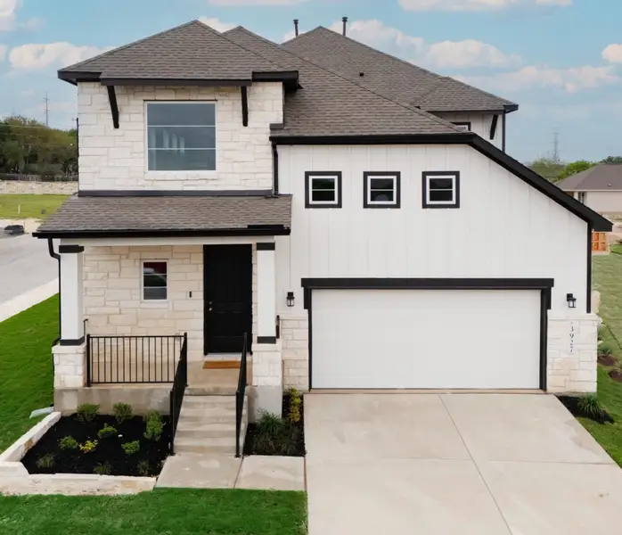 Representative exterior photo of a completed home built from the Travis by Scott Felder Homes in Flora, Hutto, TX (Image 16).