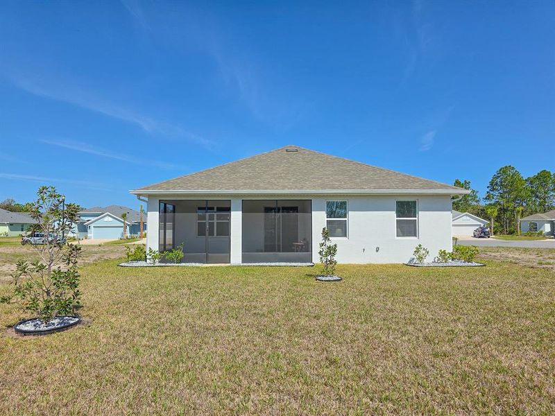 Exterior details and patio area of a home in Matanzas Cove, Palm Coast (Image 22).