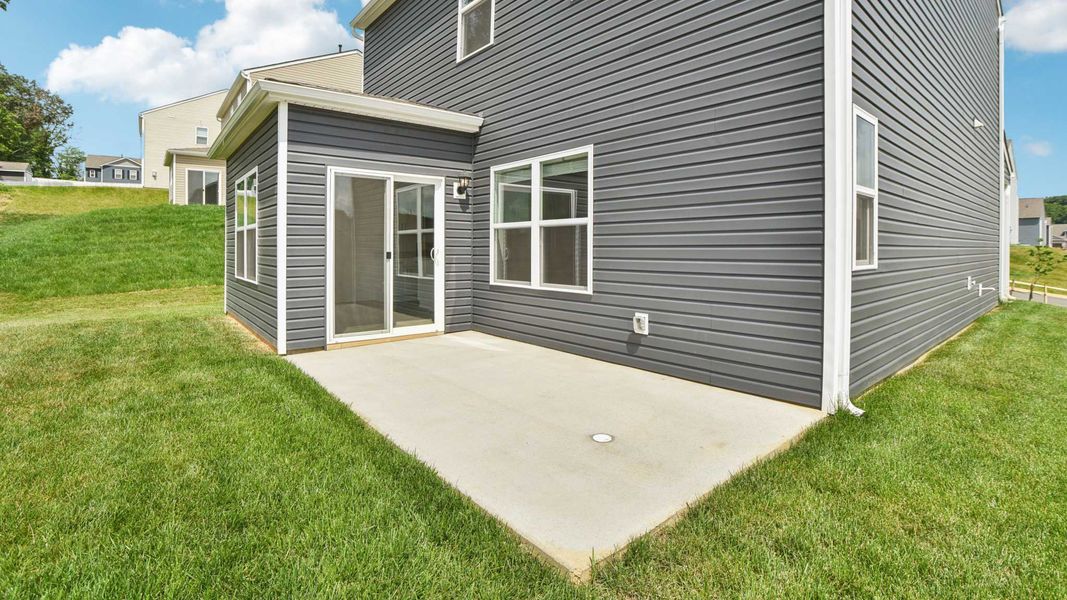 Representative exterior photo of a completed home built from the Craig by D.R. Horton in The Hideaway at Fox Meadows, Bluff City, TN (Image 21).