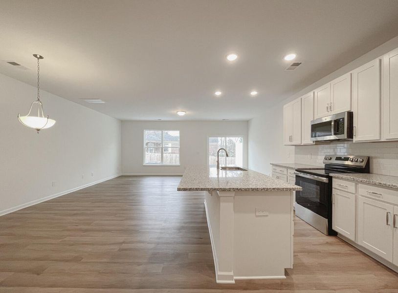 Furnished interior view inside a new home in East Main Townes, Spartanburg (Image 7).