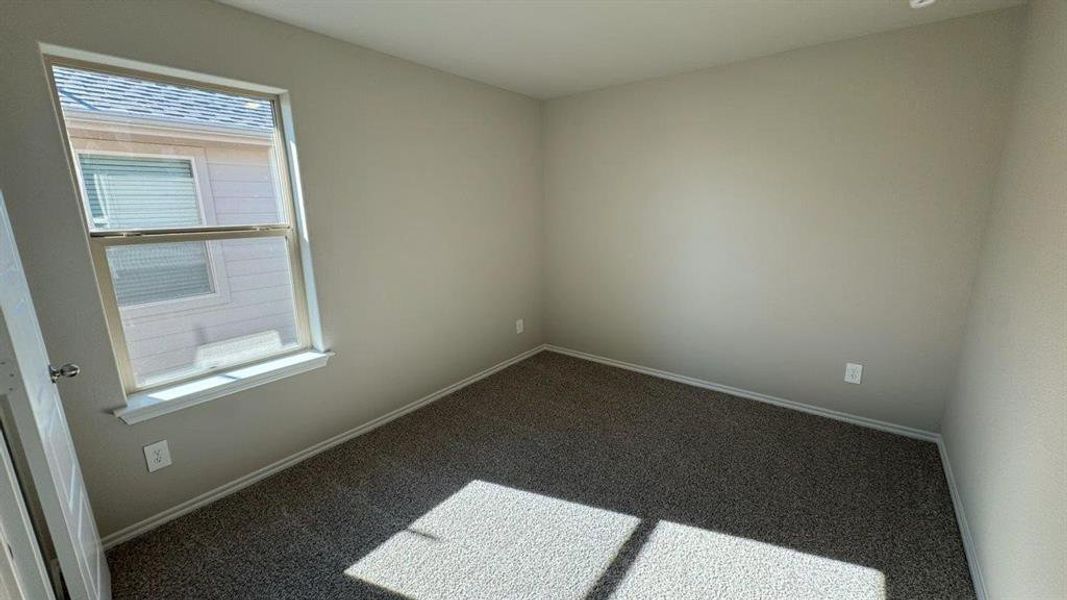 Spacious, unfurnished interior of a new home in Monarch at the Meadows, Ponder (Image 12).