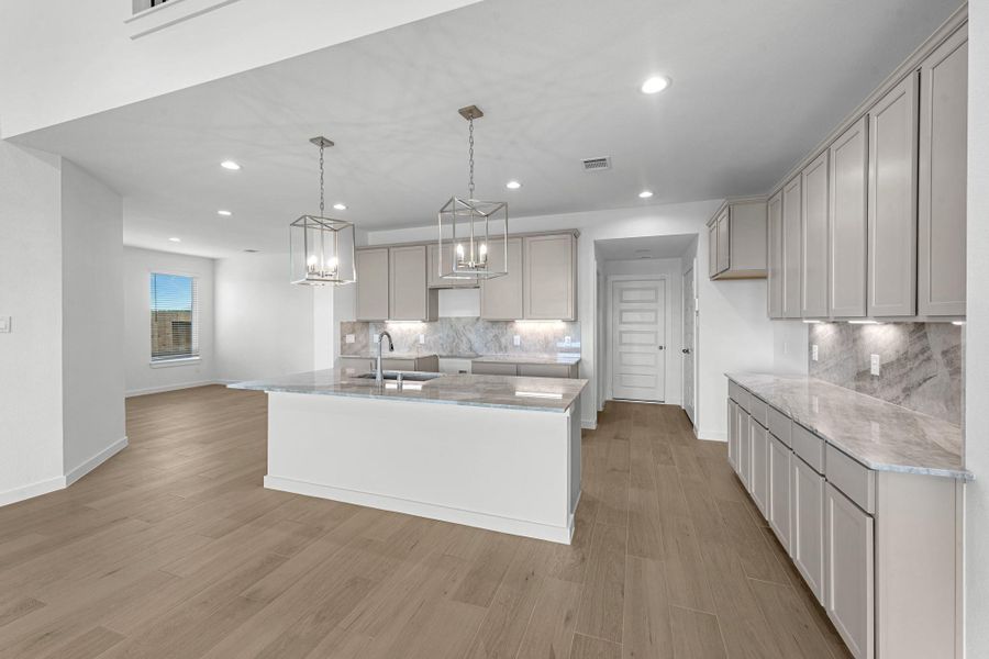 Furnished interior view inside a new home in Grand Mason Crossing, Katy (Image 6).