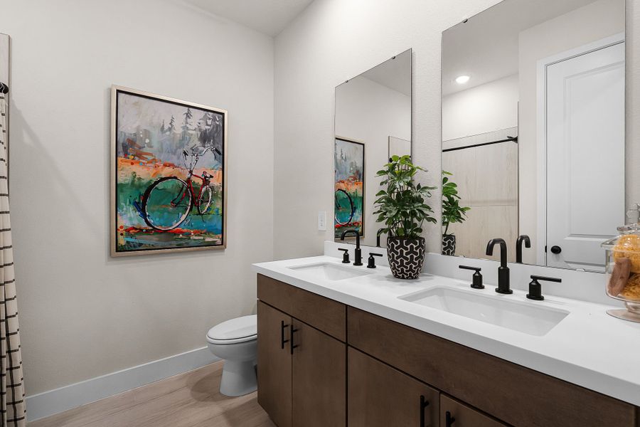 Representative furnished interior of a home built from the Everly Multi-Gen by Hartizen Homes in Eden Crest, Apopka (Image 12). Representative furnished interior of a home built from the Everly Multi-Gen by Hartizen Homes in Eden Crest, Apopka (Image 12).