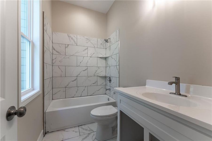 Furnished interior view inside a new home in , Suwanee (Image 4).