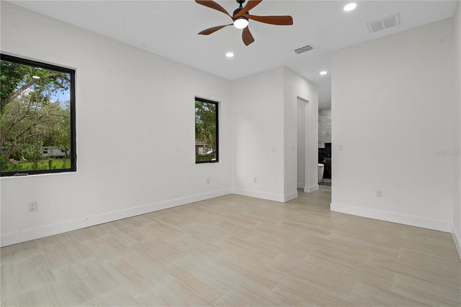 Spacious, unfurnished interior of a new home in , New Port Richey (Image 37).