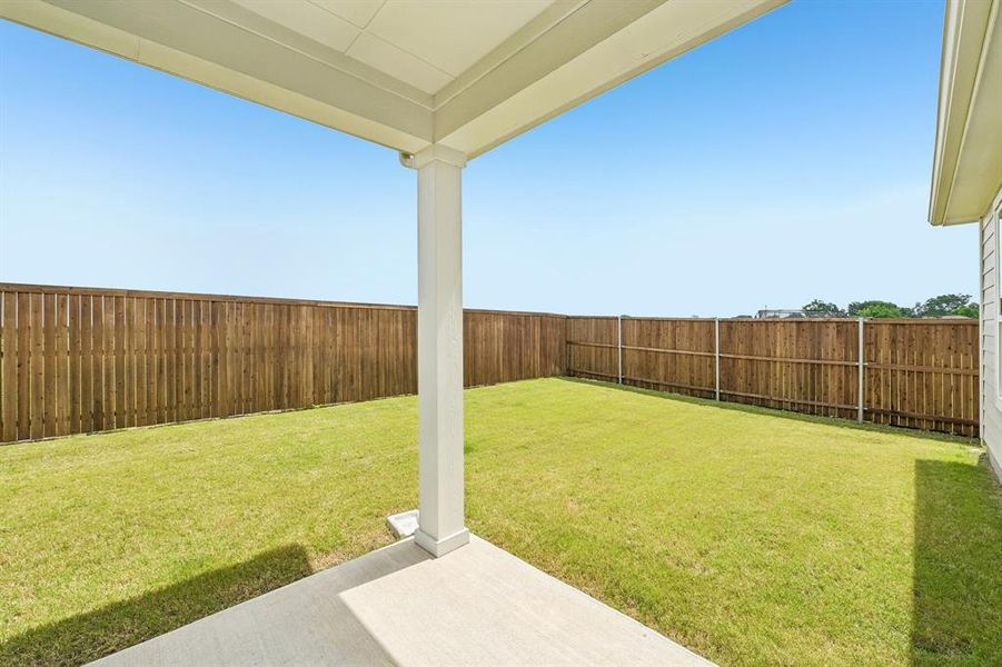 Exterior details and patio area of a home in Cottonwood Creek, Seagoville (Image 17).