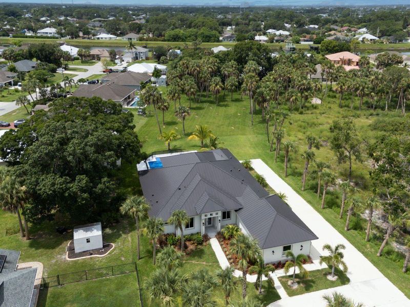 Front exterior of a new home in , Port St. Lucie, FL, highlighting curb appeal (Image 18).