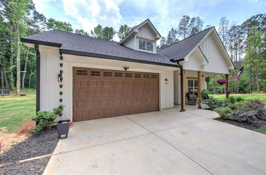 Front exterior of a new home in , Carrollton, GA, highlighting curb appeal (Image 21).