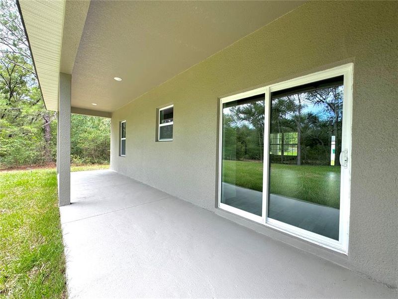 Exterior details and patio area of a home in , Citrus Springs (Image 22).