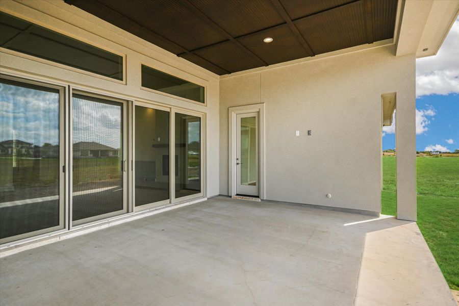 Exterior details and patio area of a home in Scofield Farms Estates, Georgetown (Image 23).