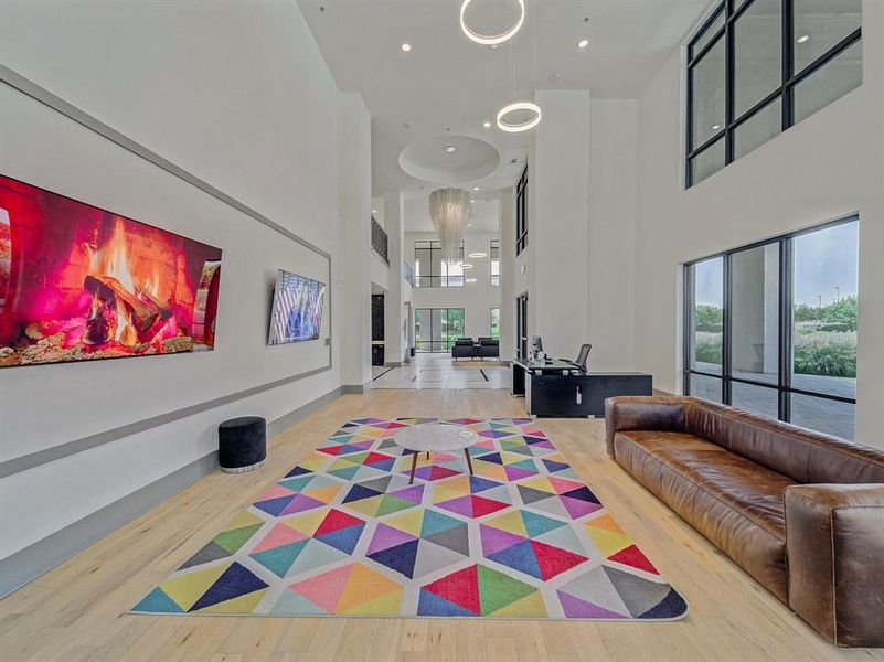 Lobby featuring a high ceiling and recessed lighting