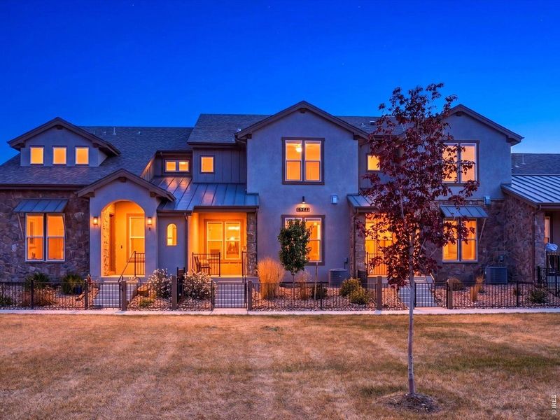 Front exterior of a new home in , Windsor, CO, highlighting curb appeal (Image 26).
