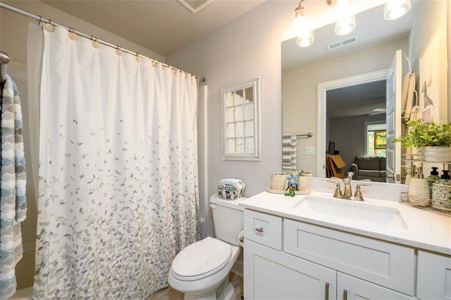 Furnished interior view inside a new home in Holiday Pines, Buford (Image 11).
