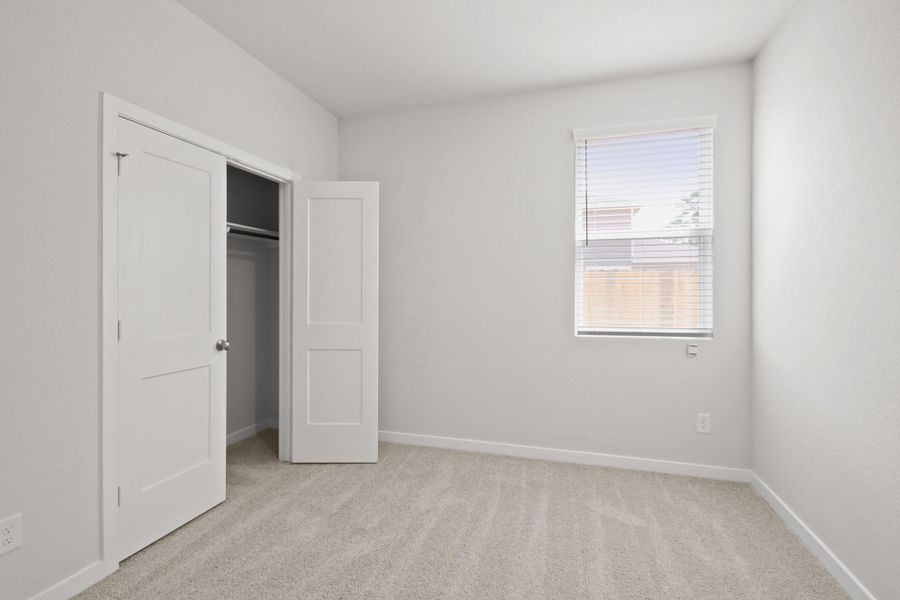 Spacious, unfurnished interior of a new home in Liberty Collection at Granger Pines, Conroe (Image 15).