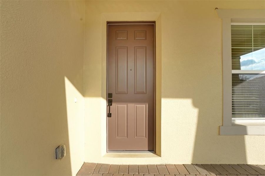 Exterior details and patio area of a home in Palms at Windermere, Windermere (Image 24).