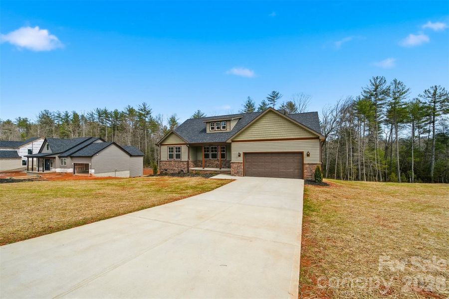 Front exterior of a new home in , Morganton, NC, highlighting curb appeal (Image 1). Front exterior of a new home in , Morganton, NC, highlighting curb appeal (Image 1).