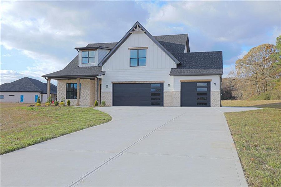 Front exterior of a new home in , Maysville, GA, highlighting curb appeal (Image 21).