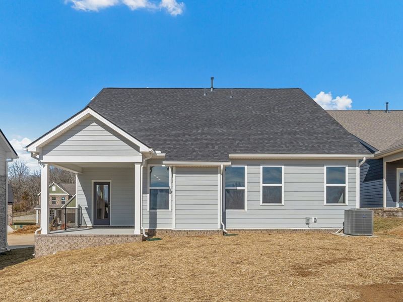 Exterior details and patio area of a home in Woods Crossing, Gallatin (Image 32).