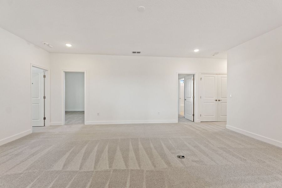 Representative unfurnished interior of a home built from the Oceanside by Park Square Residential in Paradiso Grande, Orlando (Image 24).