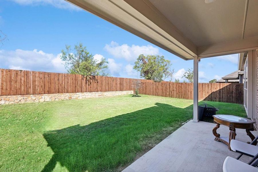 View of yard with a patio area