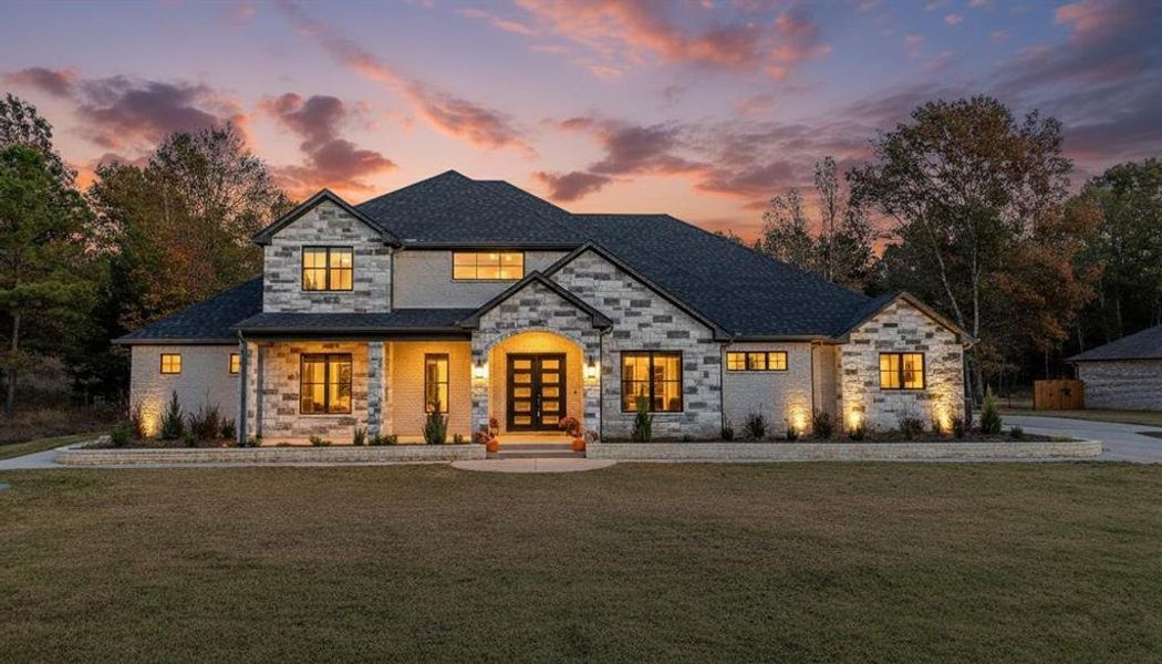 Front exterior of a new home in , Bullard, TX, highlighting curb appeal (Image 1).