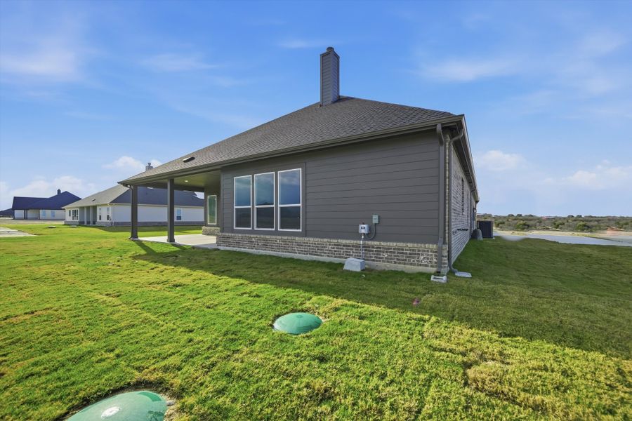 Exterior details and patio area of a home in Eagle Ridge Estates, Weatherford (Image 25).