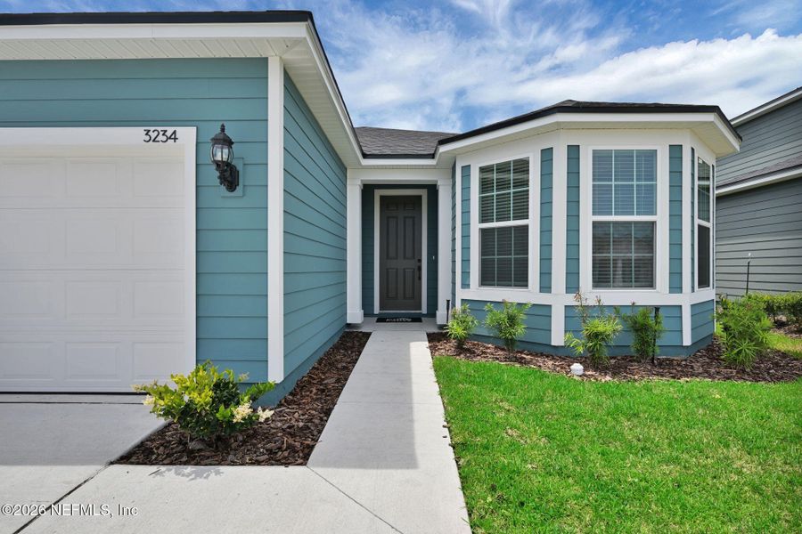 Exterior details and patio area of a home in Hyland Trail, Green Cove Springs (Image 30).