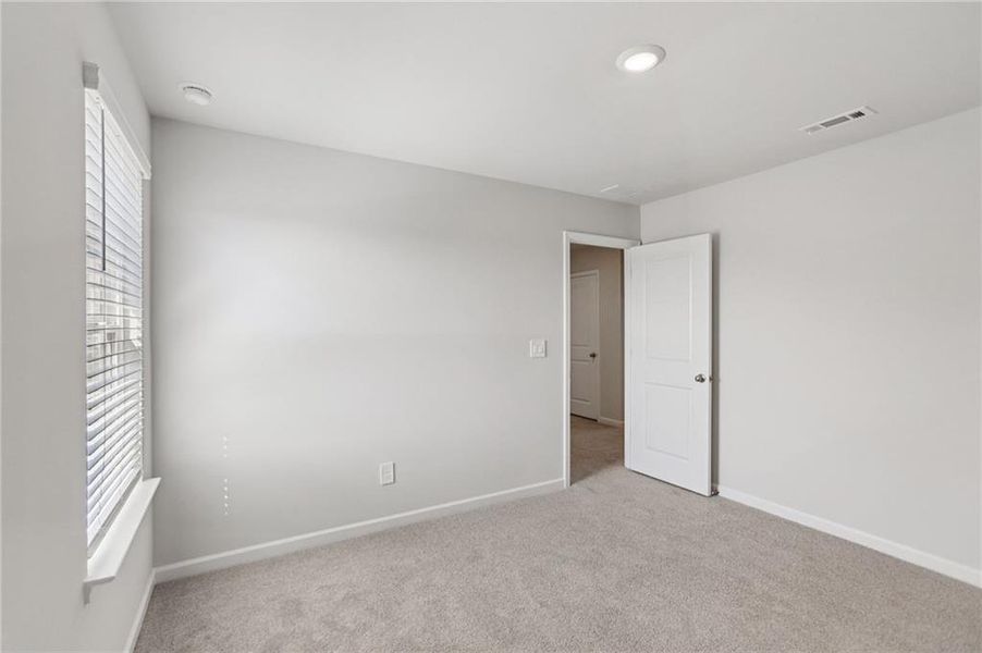 Spacious, unfurnished interior of a new home in Creekside at Oxford Park, Fairburn (Image 31). Spacious, unfurnished interior of a new home in Creekside at Oxford Park, Fairburn (Image 31).