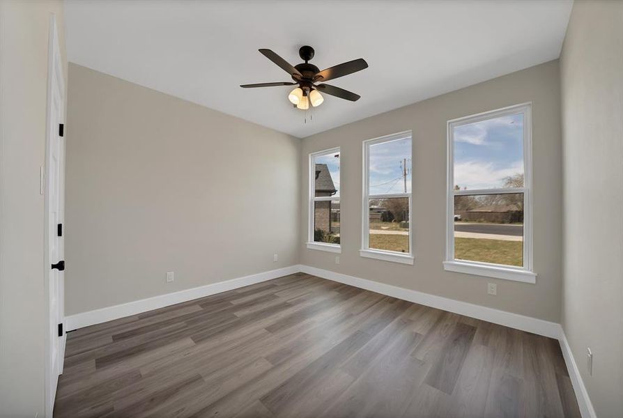 Spacious, unfurnished interior of a new home in , The Colony (Image 27).