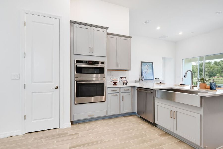 Representative furnished interior of a home built from the Saint Thomas by Taylor Morrison in Ardisia Park, New Smyrna Beach (Image 13).