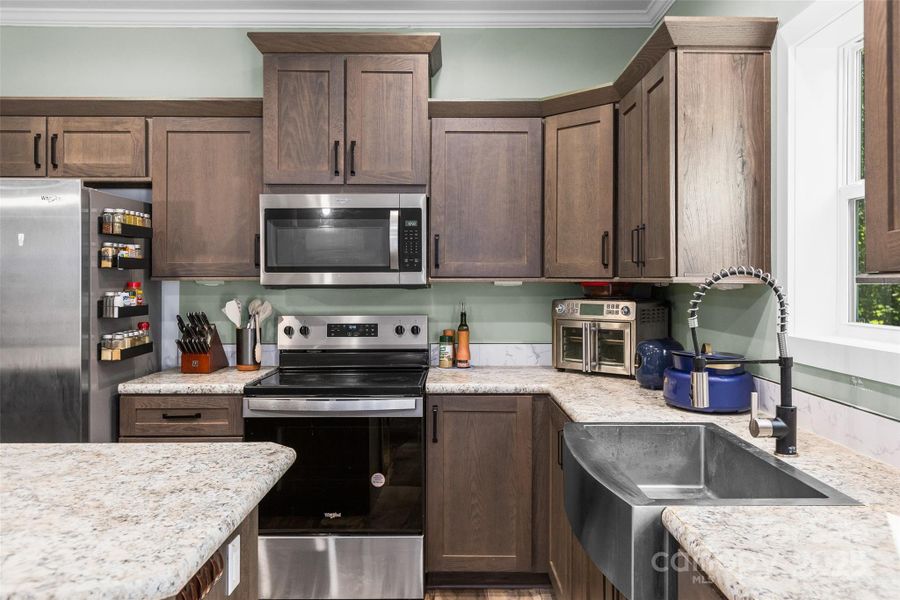 Furnished interior view inside a new home in , New London (Image 28).