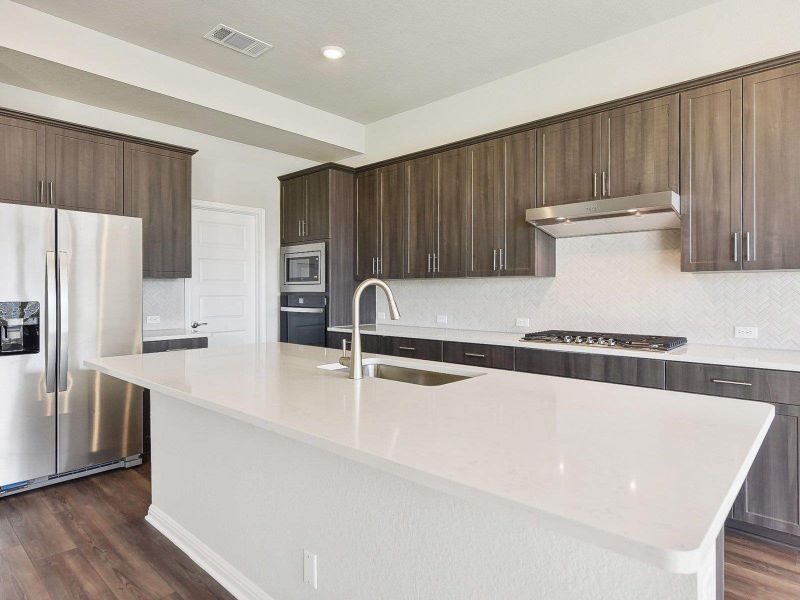 Photo is not of the actual home, but is an inspirational photo of builder’s model home and may depict options, furnishings, and/or decorator features that are not included