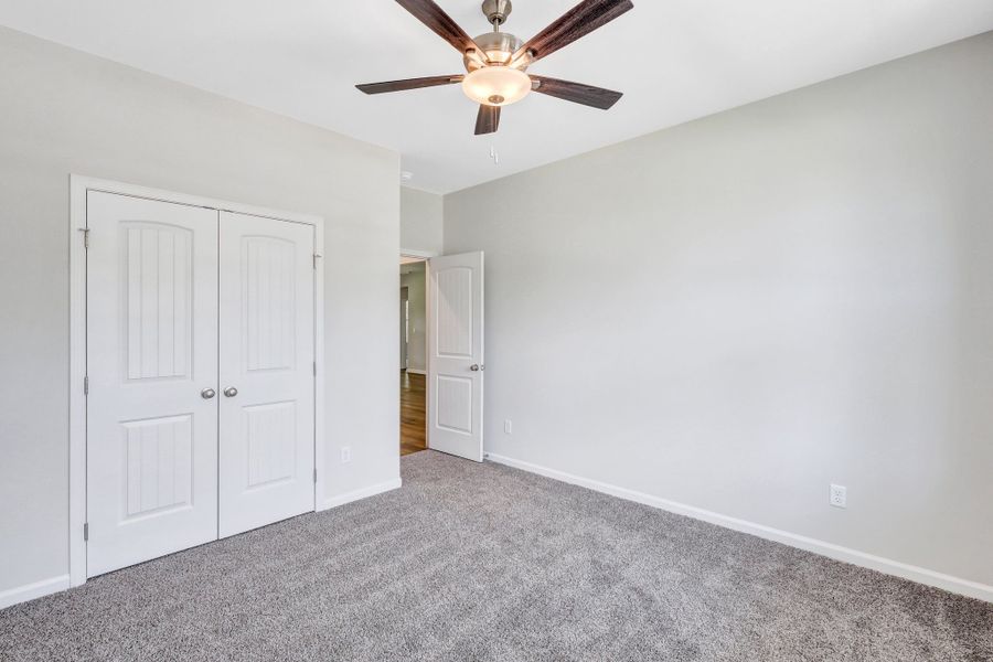 Representative unfurnished interior of a home built from the The Dublin by Smith Family Homes in Settlers Hammock, Kingsland (Image 26).