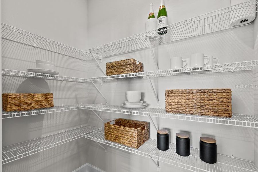 Furnished interior view inside a new home in The Cypress Series at Reserve East, Flagler Beach (Image 32).