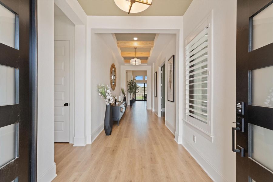 Step inside to soaring ceilings, abundant natural light, and thoughtfully curated designer finishes throughout.