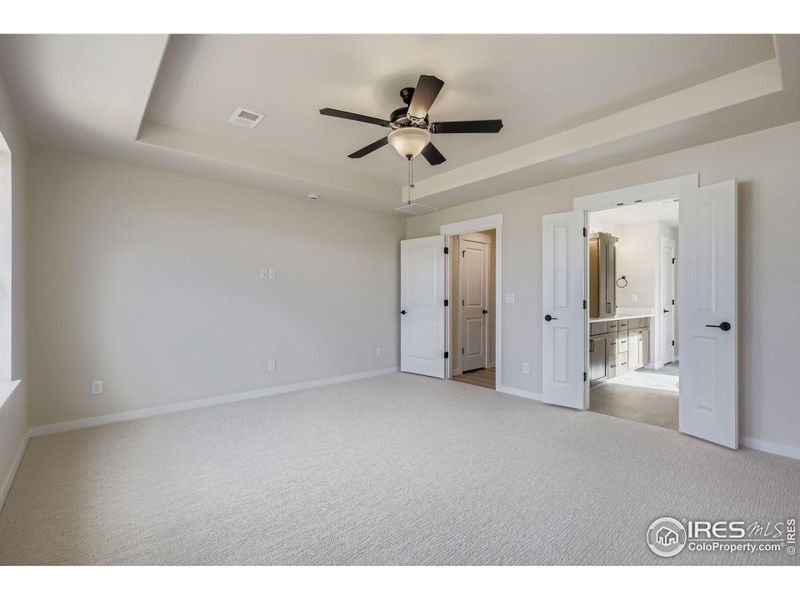 Spacious, unfurnished interior of a new home in RainDance National 60/70, Windsor (Image 22).