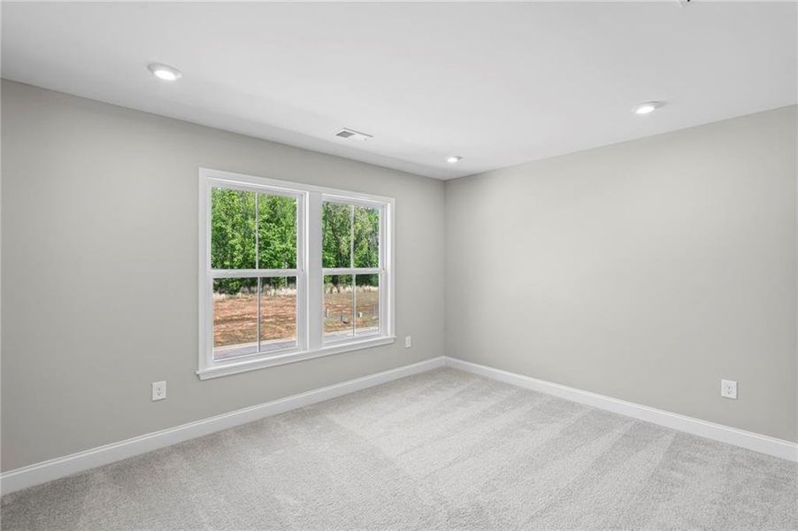 Spacious, unfurnished interior of a new home in Hidden Fields, Hoschton (Image 38). Spacious, unfurnished interior of a new home in Hidden Fields, Hoschton (Image 38).