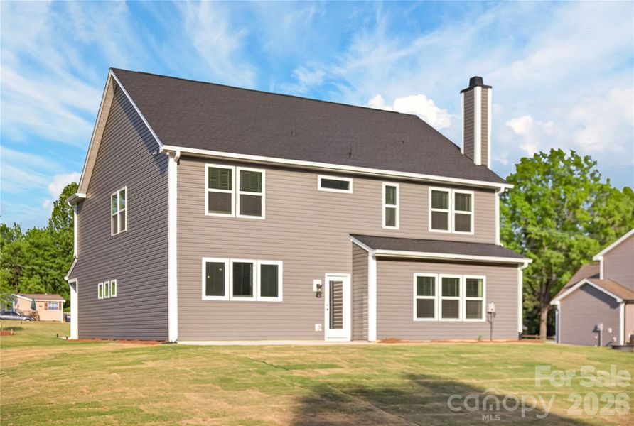 Exterior details and patio area of a home in , Troutman (Image 3).