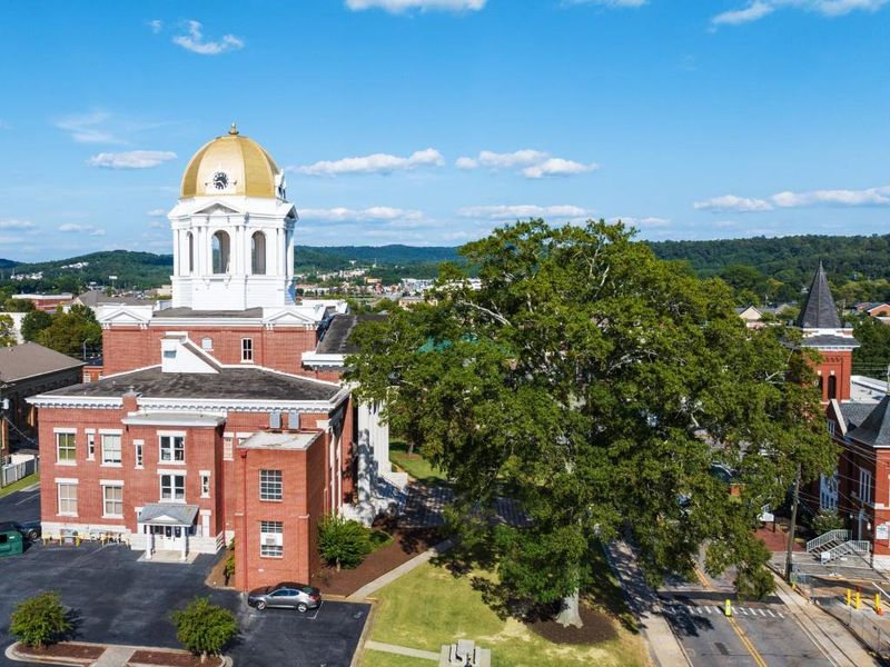Front exterior of a new home in Parkside at Carter Grove, Cartersville, GA, highlighting curb appeal (Image 22).